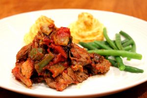 The final dish - slow roasted Greek roast with duchess potatoes and green beans