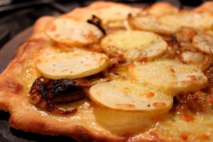 Potato, rosemary and caramelised onion pizza